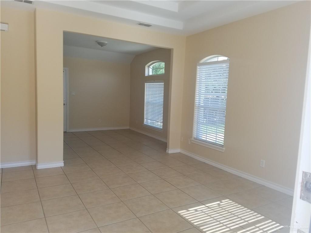 1208 West Wisconsin Road, Unit C Edinburg, TX 78539 - Photo 5 of 16 a view of an empty room with a window