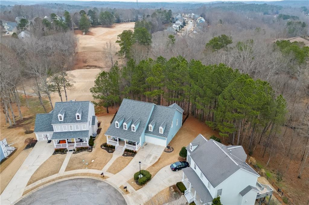 5751 Community Lane Hoschton, GA 30548 - Photo 62 of 64 an aerial view of residential house with outdoor space