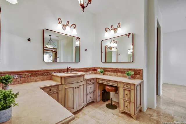 a bathroom with a tub and shower