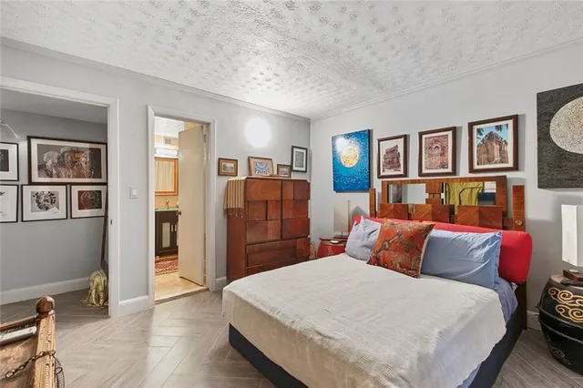 a view of a chairs and tables in the patio and a fountain