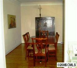 17605 Calverton Road Huntersville, NC 28078 - Photo 2 of 8 a view of a dining room with furniture and wooden floor