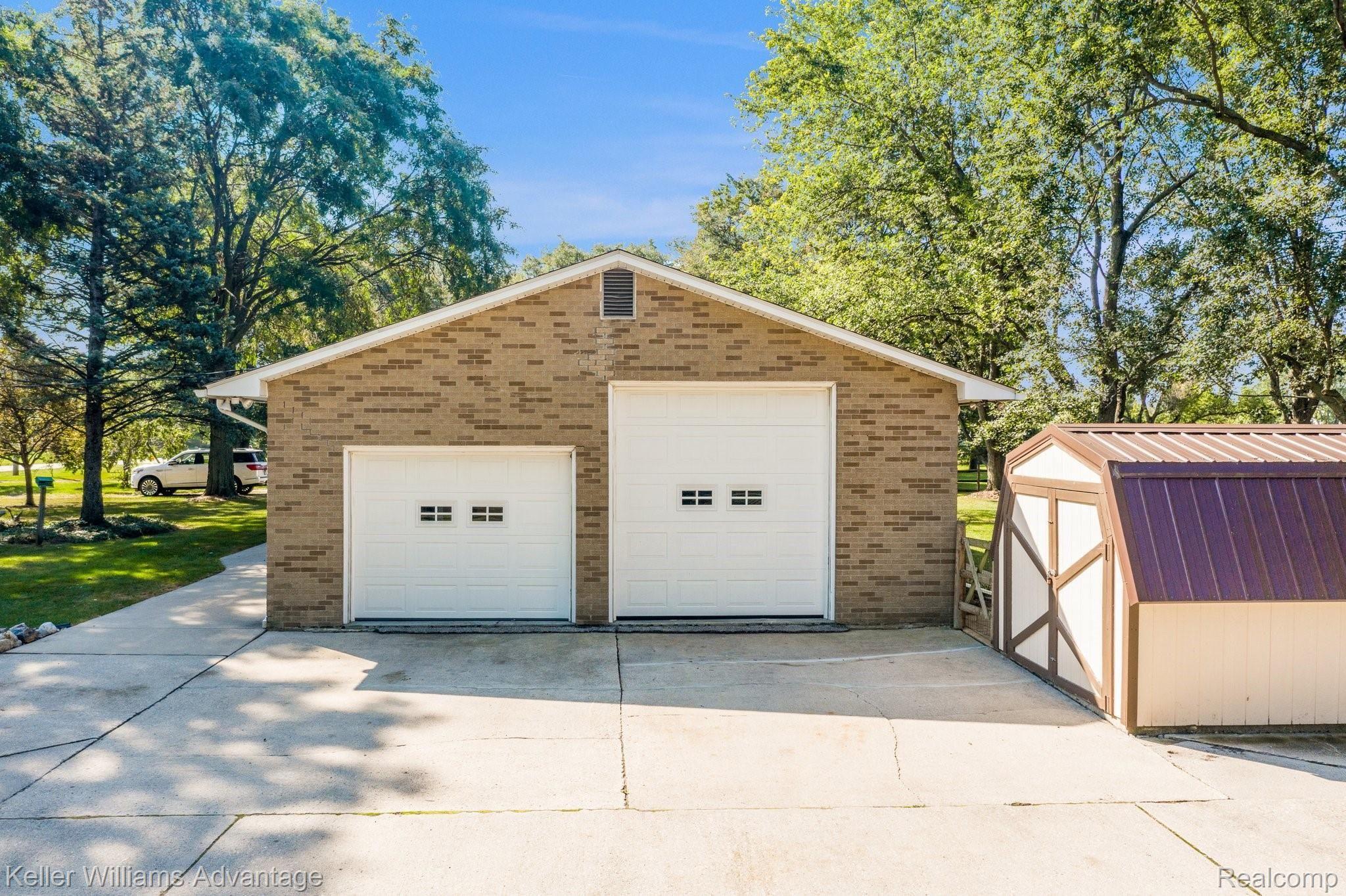 29260 Olmstead Road Flat Rock, MI 48134 - Photo 20 of 30 2 Car Garage plus extra storage in shed