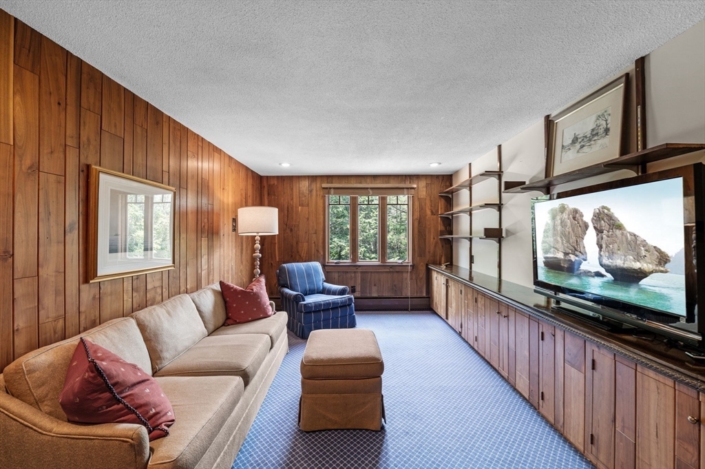 7 Ratlin Road Marblehead, MA 01945 - Photo 13 of 23 a living room with furniture and a flat screen tv