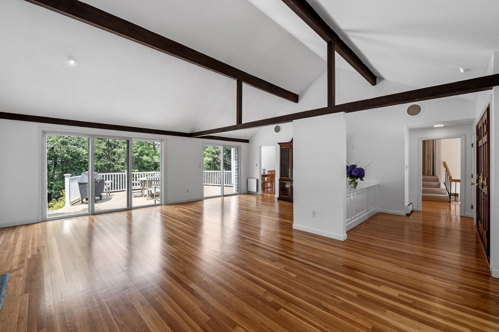 7 Ratlin Road Marblehead, MA 01945 - Photo 5 of 23 a view of empty room with wooden floor and furniture