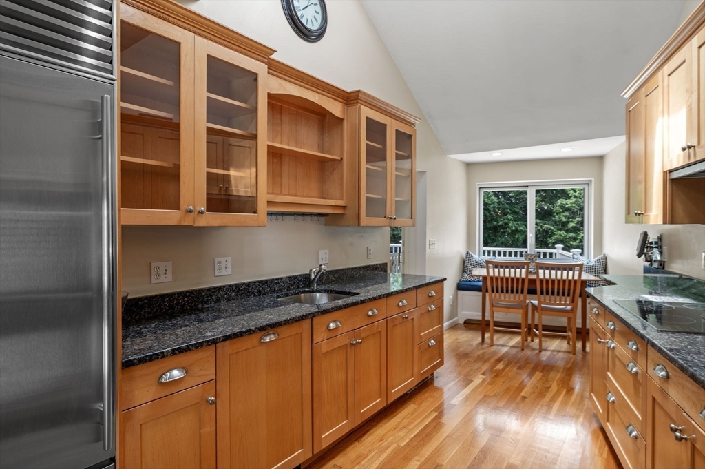 7 Ratlin Road Marblehead, MA 01945 - Photo 8 of 23 a kitchen with stainless steel appliances granite countertop a stove a sink and a granite counter tops with wooden floors
