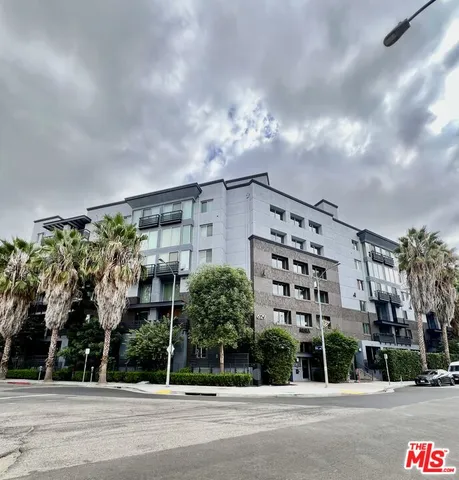 a view of a building with a street