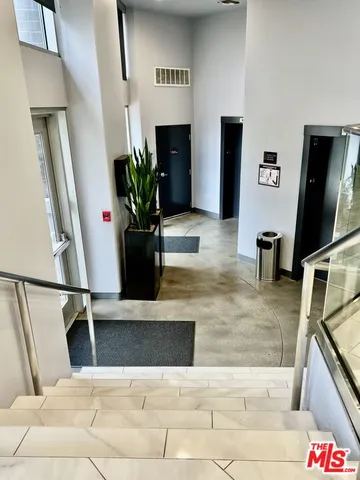 a gym with lots of furniture