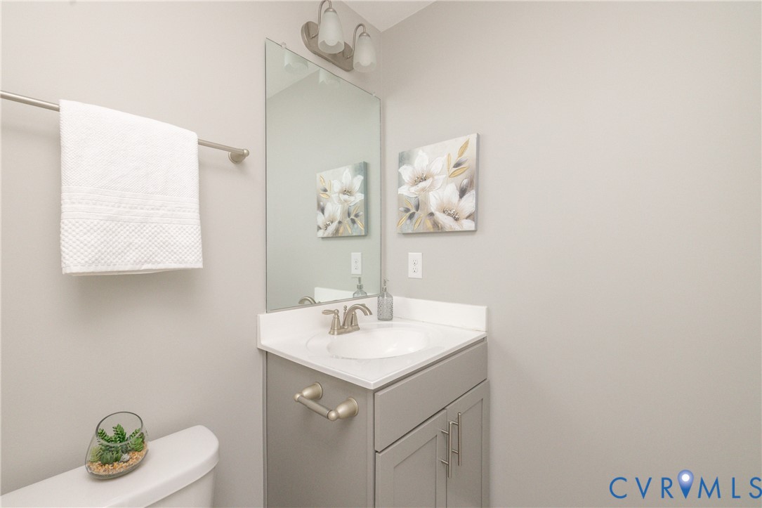 6418 Cassia Loop Moseley, VA 23120 - Photo 18 of 38 Half bath on same level as living, dining and kitc
