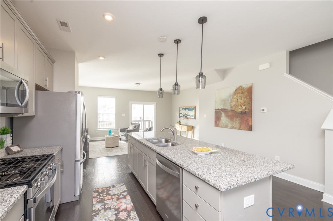 6418 Cassia Loop Moseley, VA 23120 - Photo 2 of 38 The kitchen features stainless appliances, includi