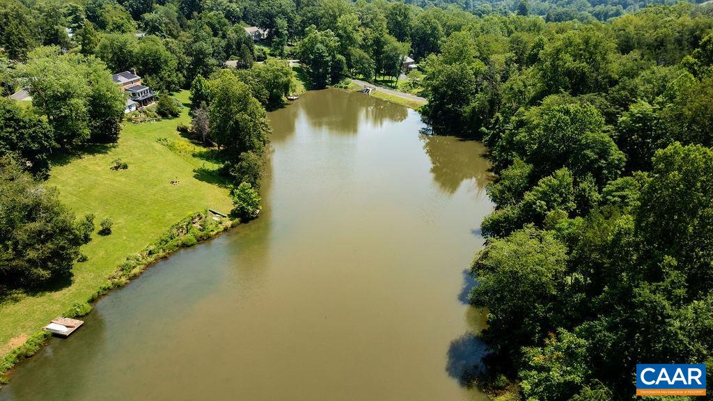 a view of a lake with a houses