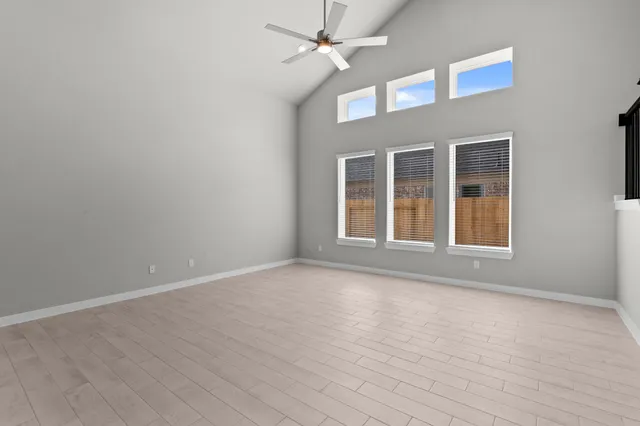 an empty room with closet area