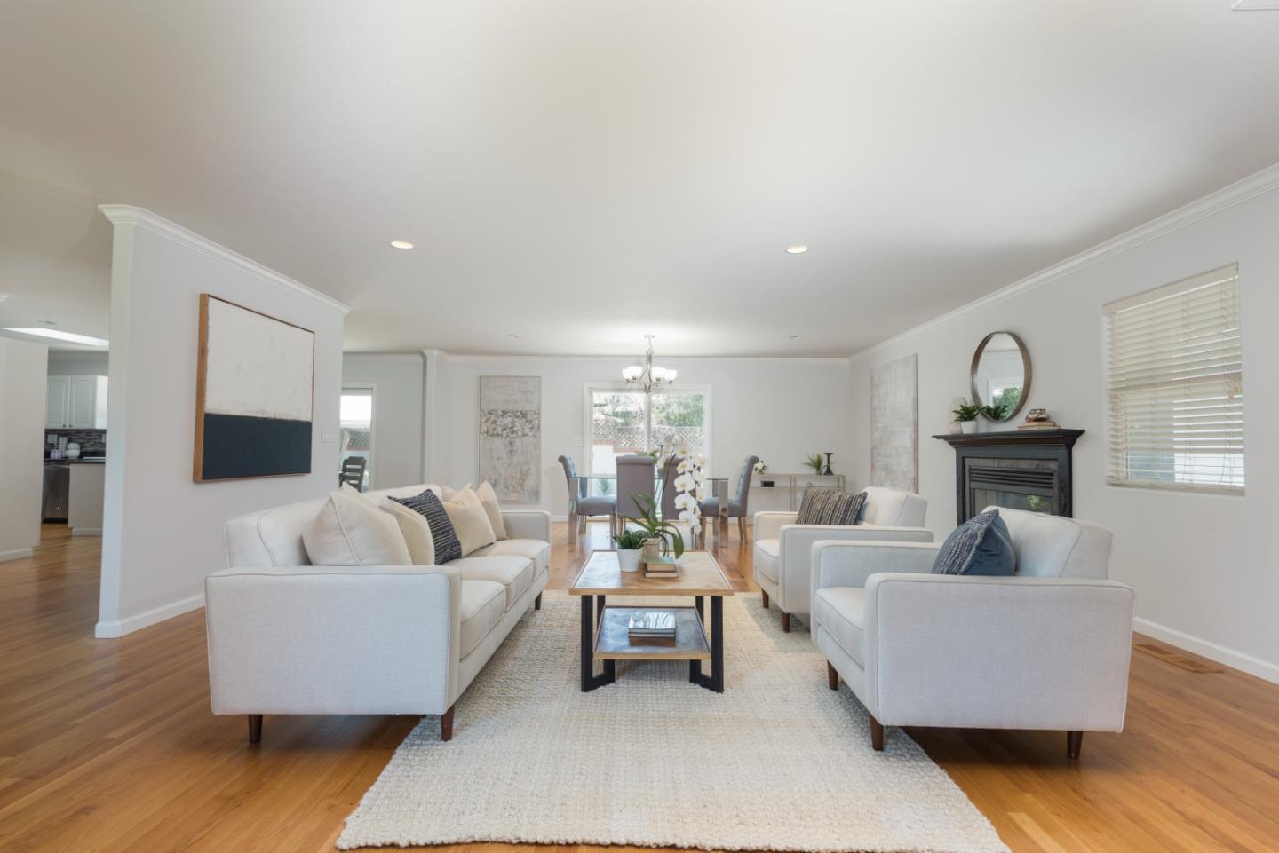 230 Springer Road Los Altos, CA 94024 - Photo 3 of 28 a living room with furniture and a wooden floor