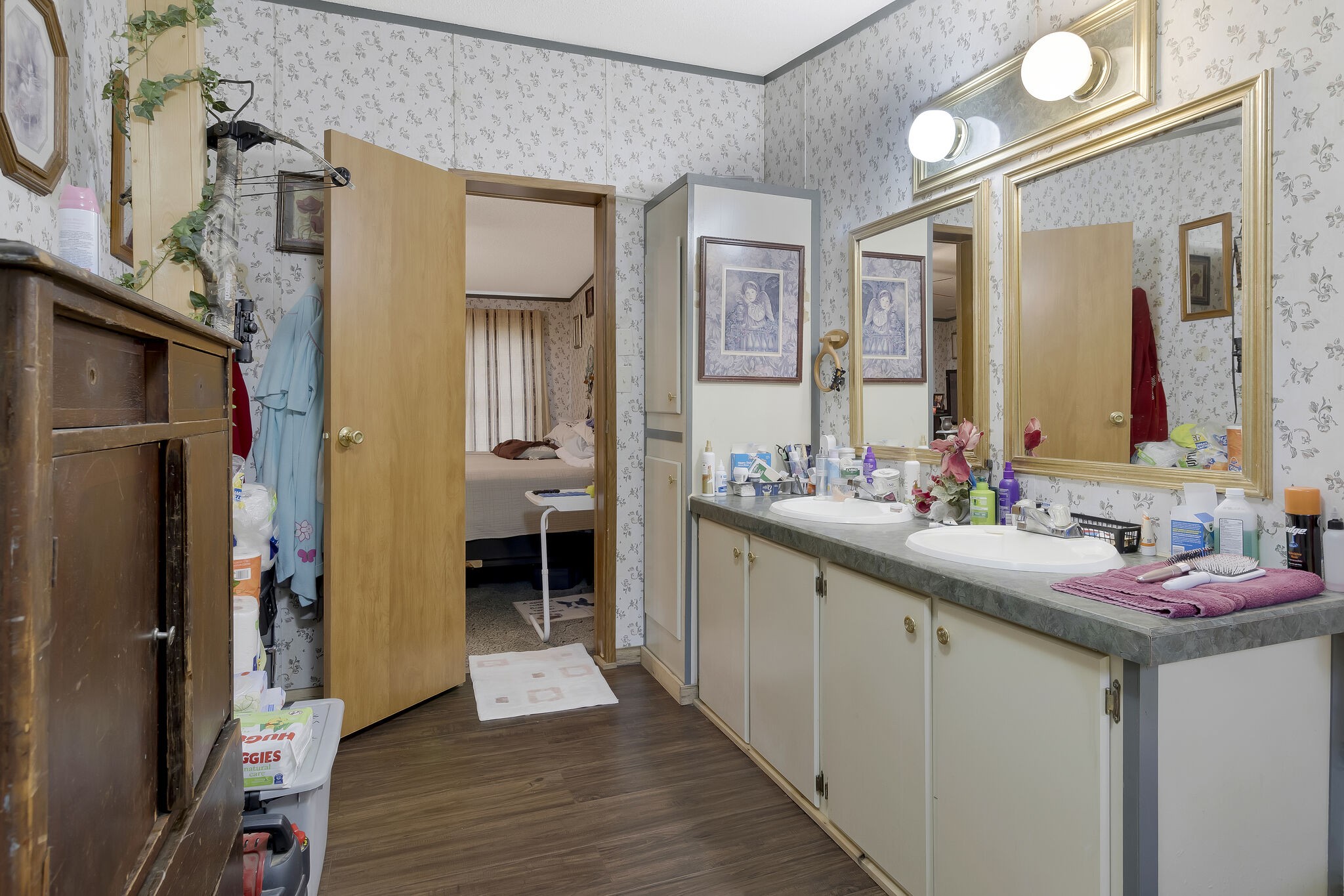 3209 Manley Drive Centerville, TN 37033 - Photo 14 of 23 a en suite bathroom with a granite countertop sink and a mirror