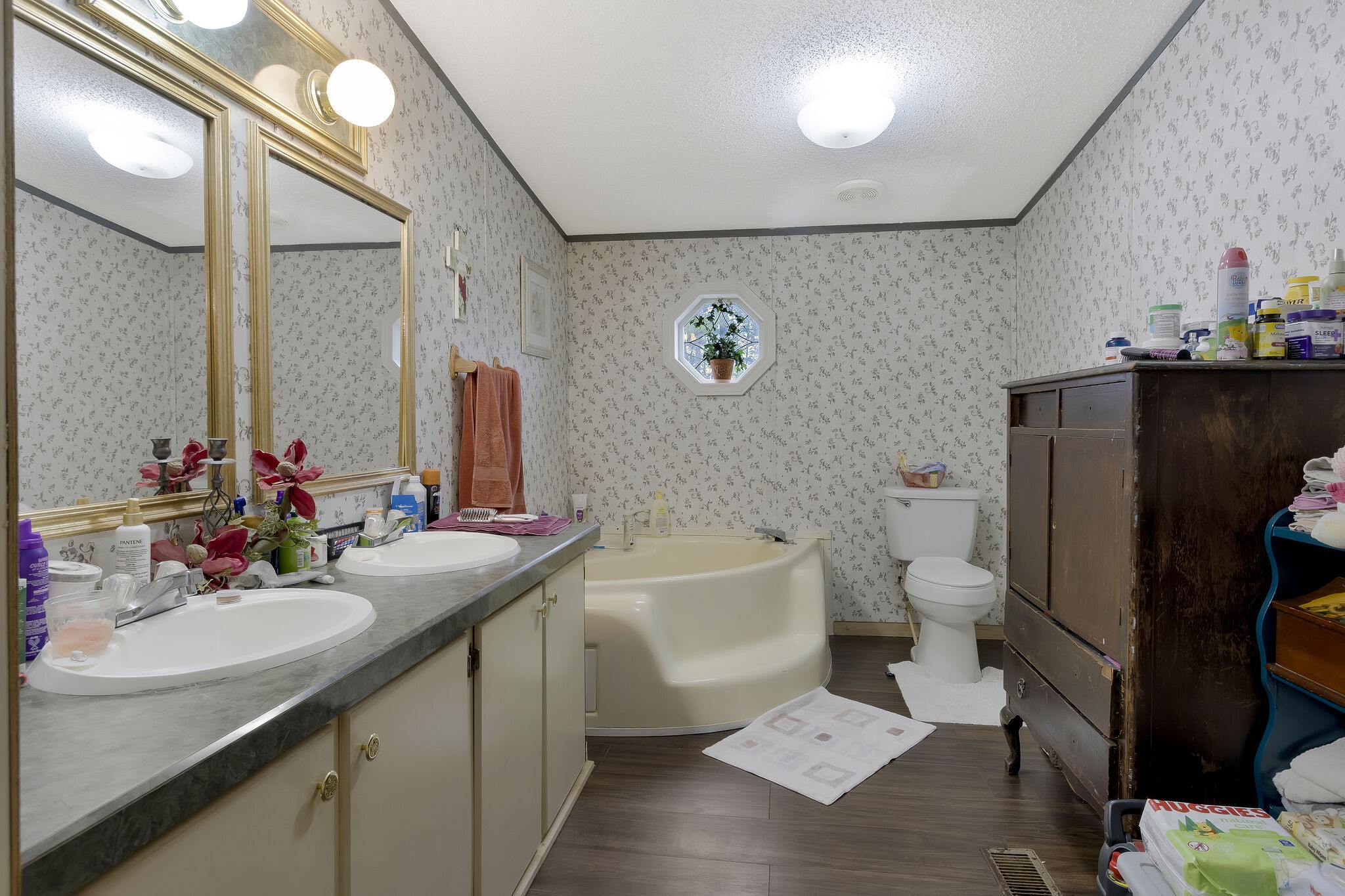 3209 Manley Drive Centerville, TN 37033 - Photo 15 of 23 a bathroom with a sink a toilet and a mirror