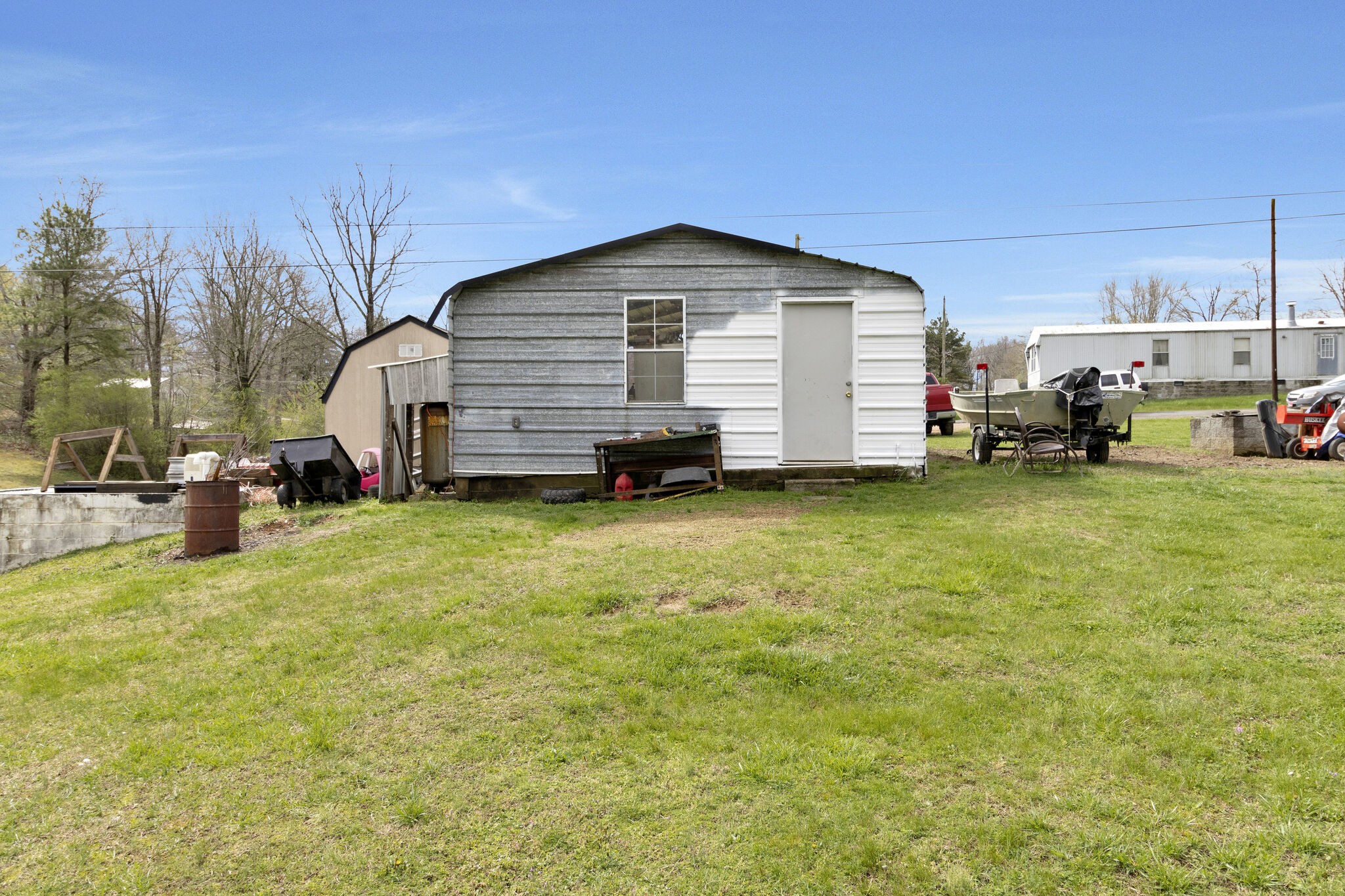 3209 Manley Drive Centerville, TN 37033 - Photo 19 of 23 a view of a house with a yard and sitting area