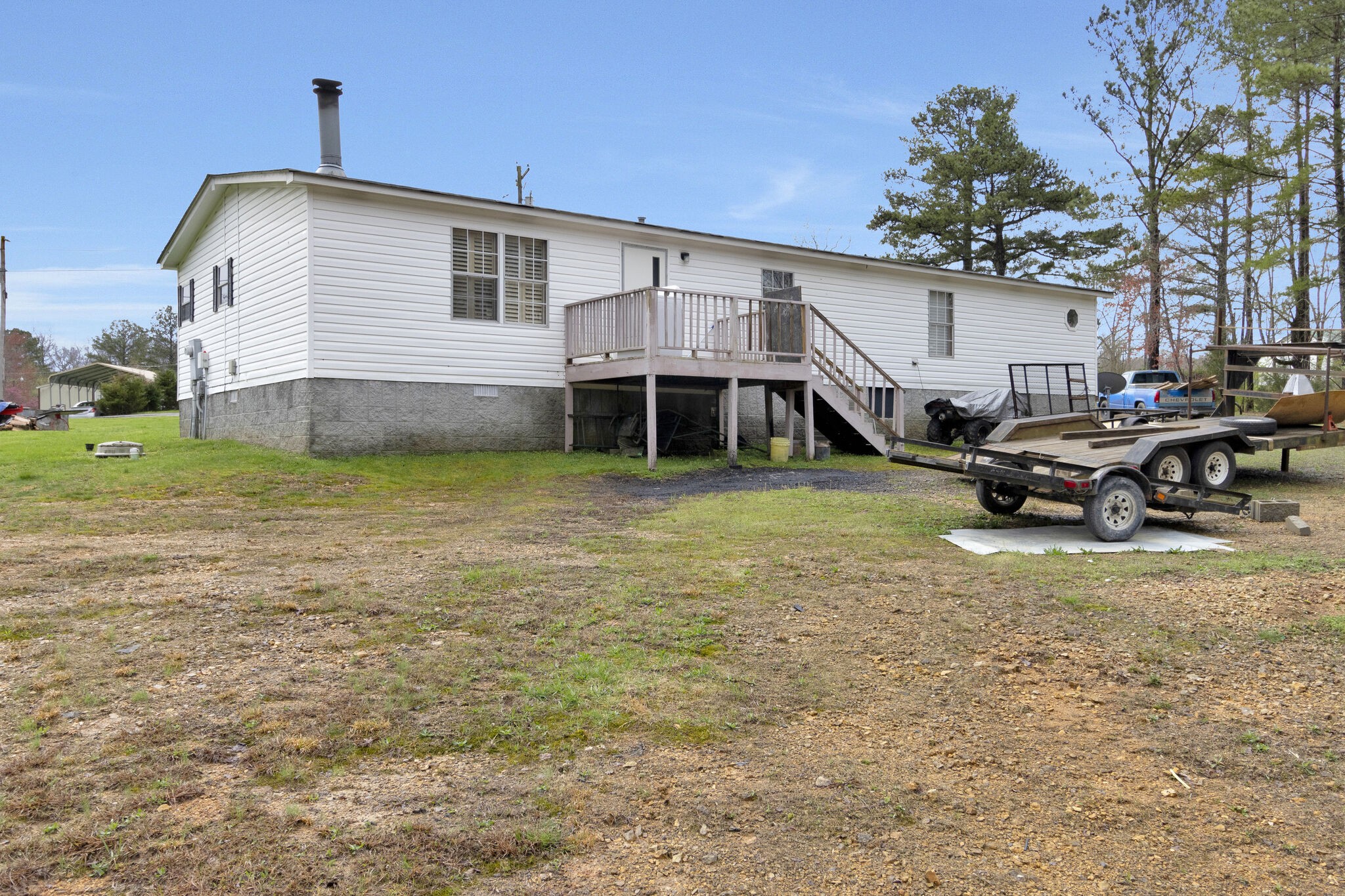 3209 Manley Drive Centerville, TN 37033 - Photo 3 of 23 a front view of a house with garden