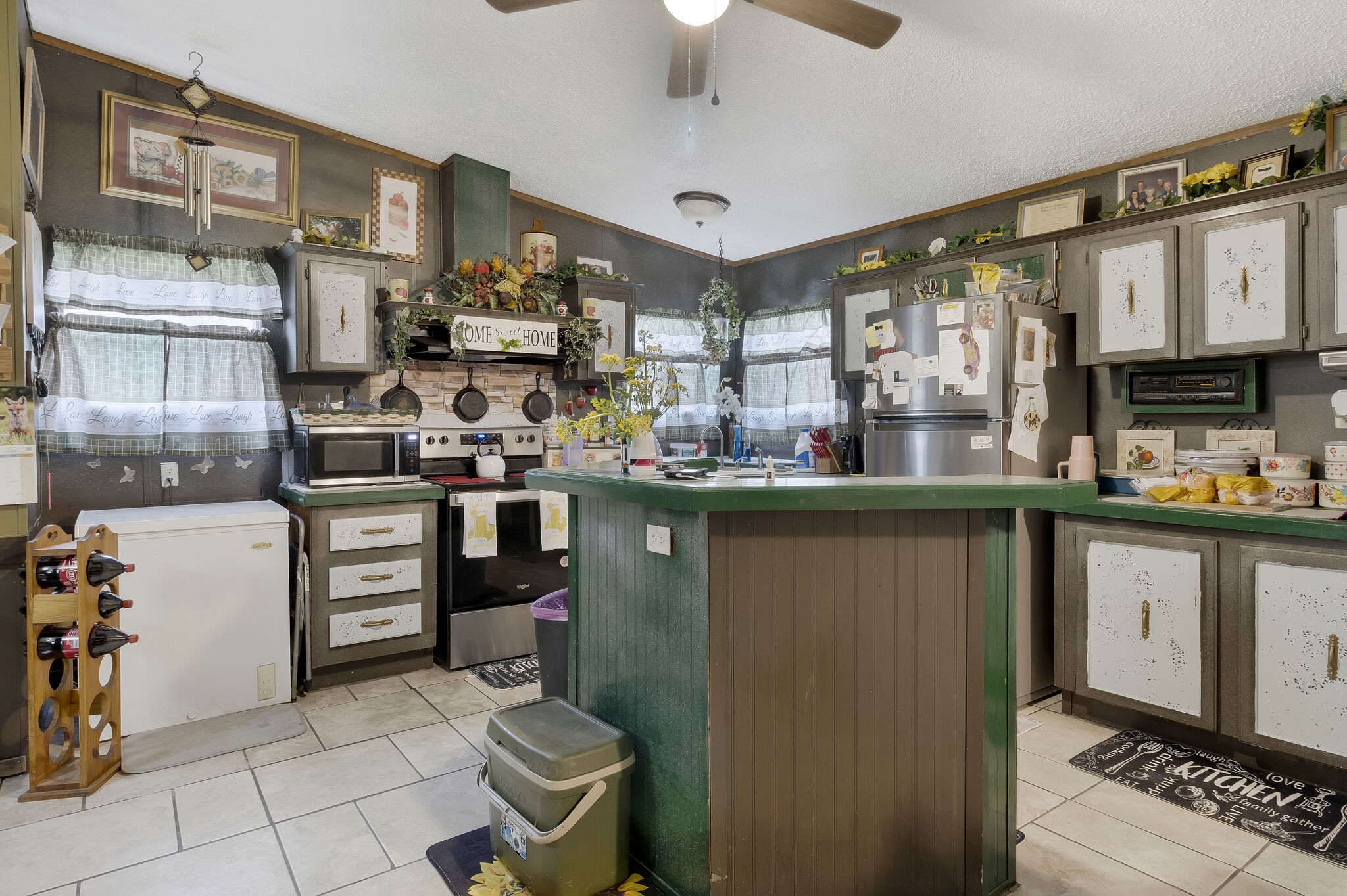 3209 Manley Drive Centerville, TN 37033 - Photo 8 of 23 a kitchen with a sink appliances and cabinets