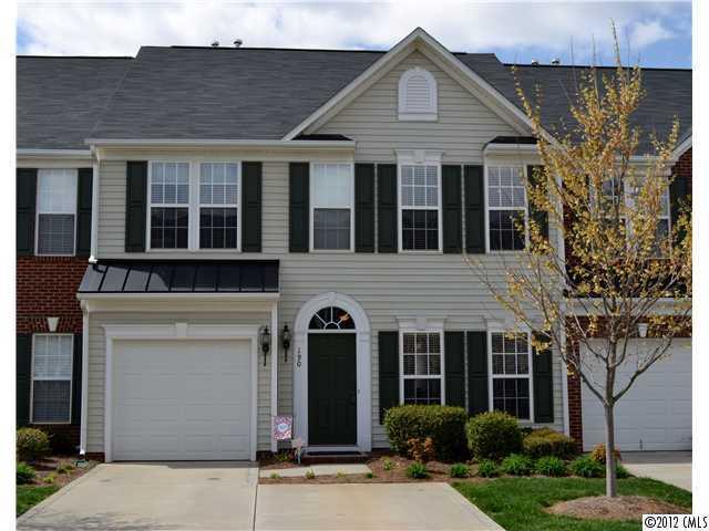 190 Snead Road, Unit 190 Fort Mill, SC 29715 - Photo 1 of 16 a front view of a house with garden