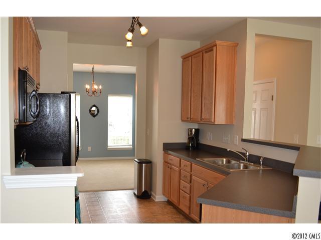 190 Snead Road, Unit 190 Fort Mill, SC 29715 - Photo 5 of 16 a bathroom with a sink and a mirror