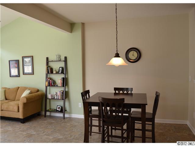 190 Snead Road, Unit 190 Fort Mill, SC 29715 - Photo 6 of 16 a view of a dining room with furniture and a table