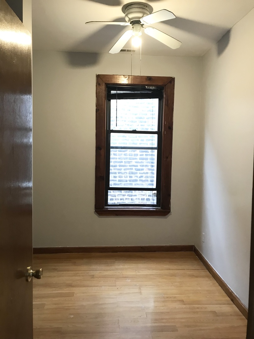 940 West 31st Place, Unit 2F Chicago, IL 60608 - Photo 3 of 10 a view of an empty room with a window