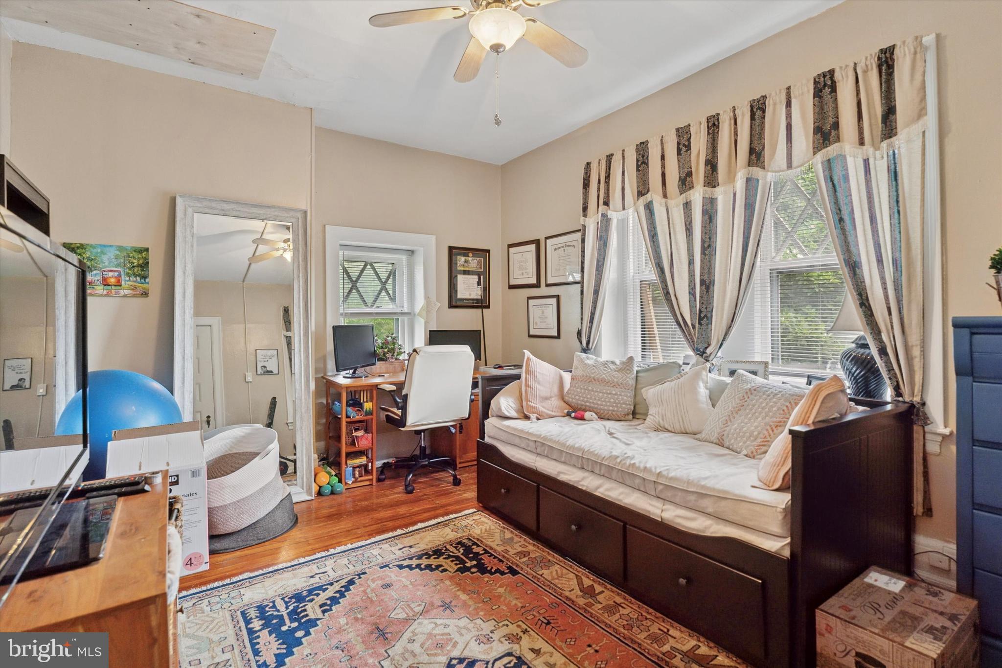 2814 Midvale Avenue Philadelphia, PA 19129 - Photo 16 of 25 a living room with furniture and a large window