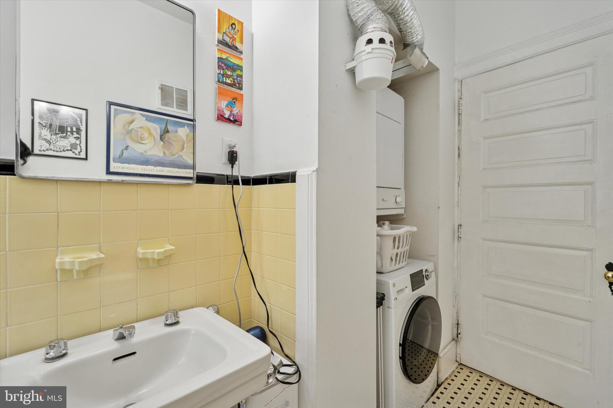 2814 Midvale Avenue Philadelphia, PA 19129 - Photo 19 of 25 a bathroom with a sink mirror and toilet
