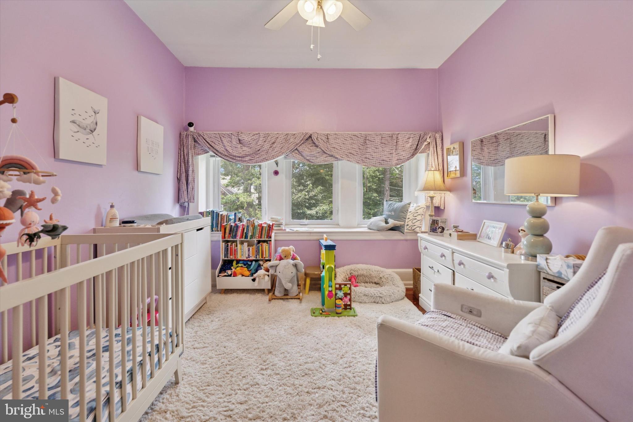 2814 Midvale Avenue Philadelphia, PA 19129 - Photo 22 of 25 a living room with furniture and a large window