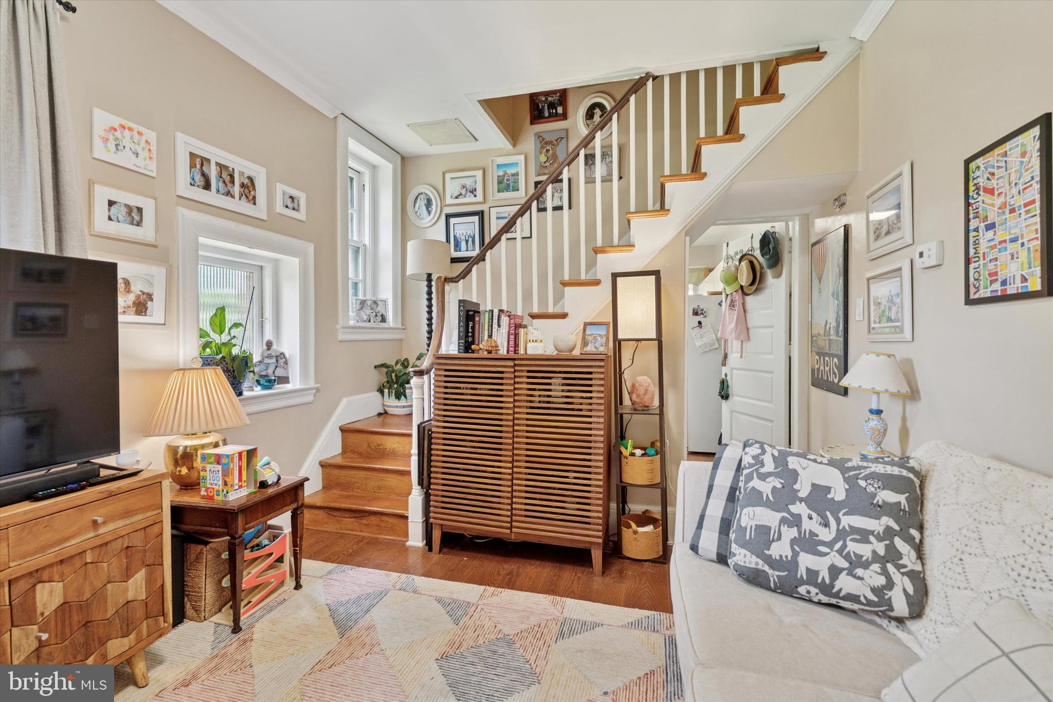2814 Midvale Avenue Philadelphia, PA 19129 - Photo 8 of 25 a living room with furniture and a flat screen tv
