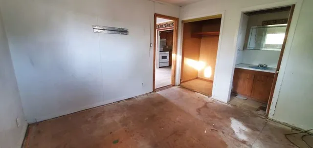 a view of a room with an empty space