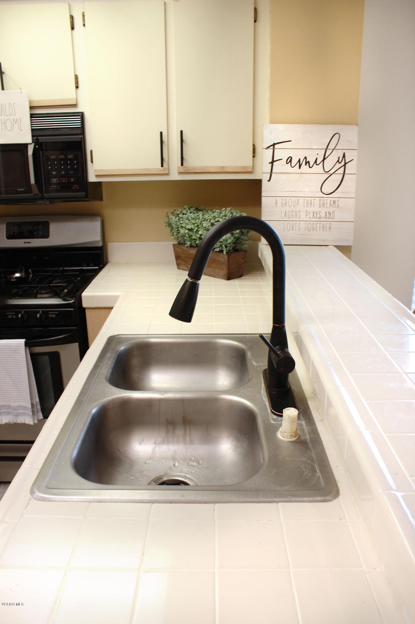 4240 Lost Hills Road, Unit 2907 Calabasas, CA 91301 - Photo 11 of 31 a close view of sink and tap