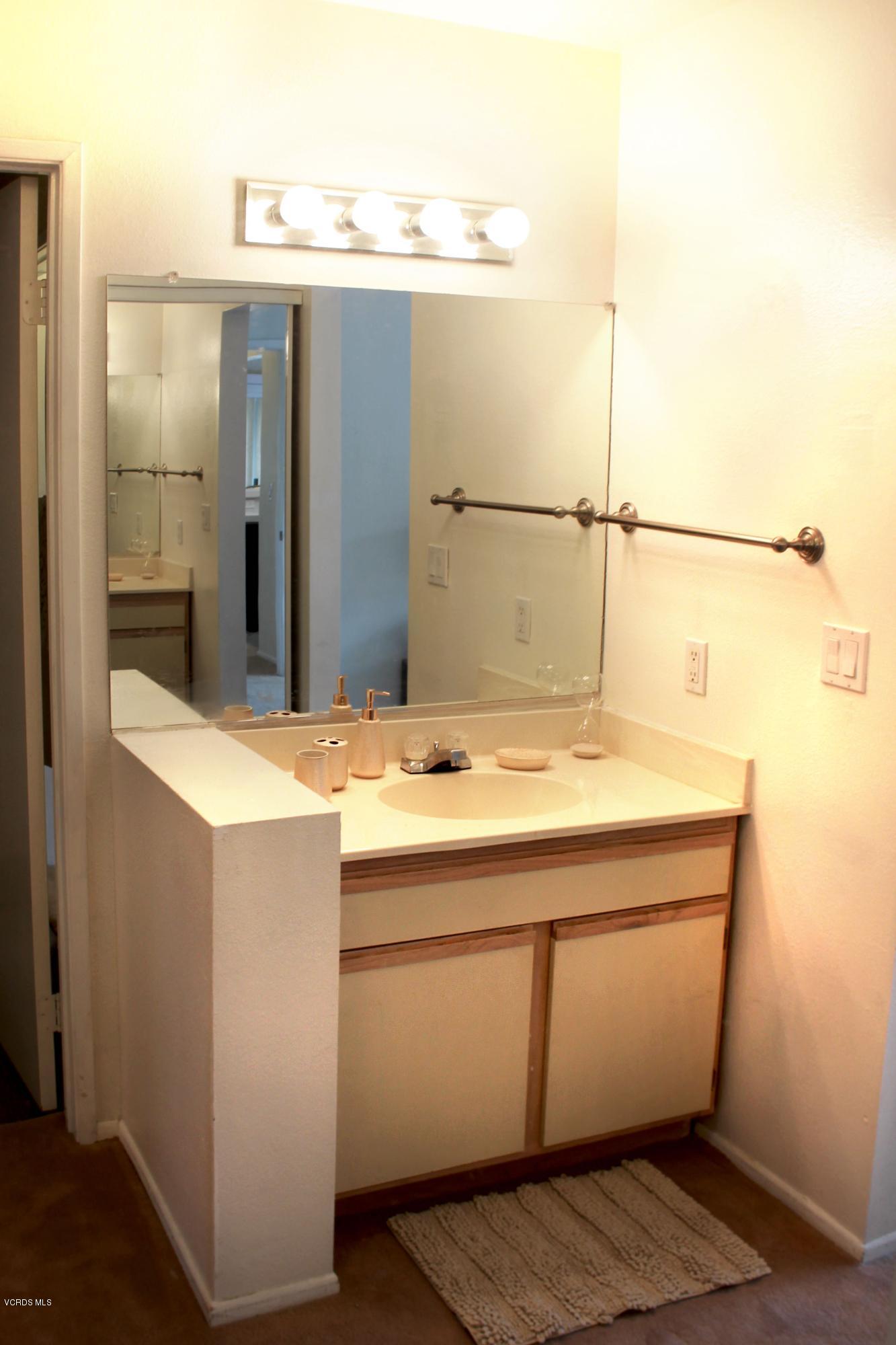 4240 Lost Hills Road, Unit 2907 Calabasas, CA 91301 - Photo 17 of 31 a utility room with washer and dryer