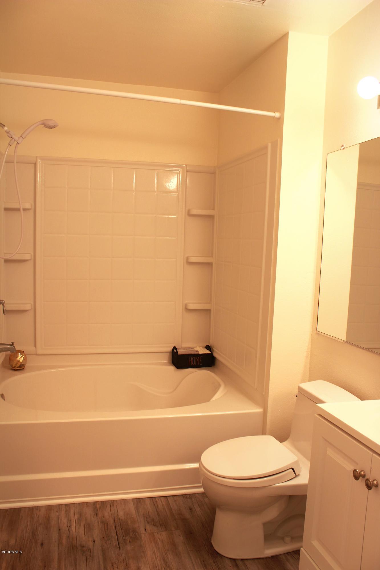 4240 Lost Hills Road, Unit 2907 Calabasas, CA 91301 - Photo 19 of 31 a bathroom with a toilet and a shower