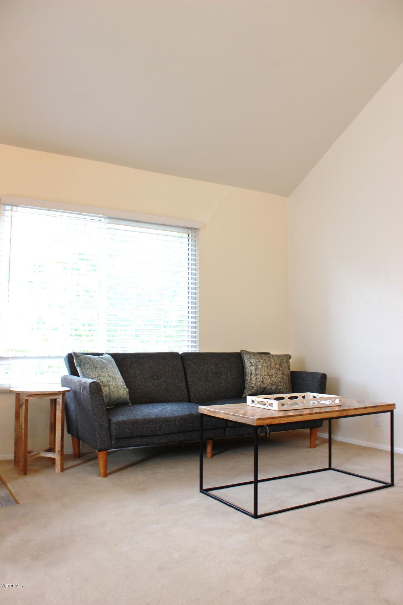 4240 Lost Hills Road, Unit 2907 Calabasas, CA 91301 - Photo 9 of 31 a living room with furniture and a couch