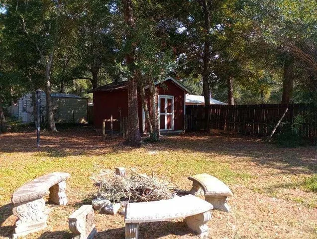 a view of swimming pool with a patio