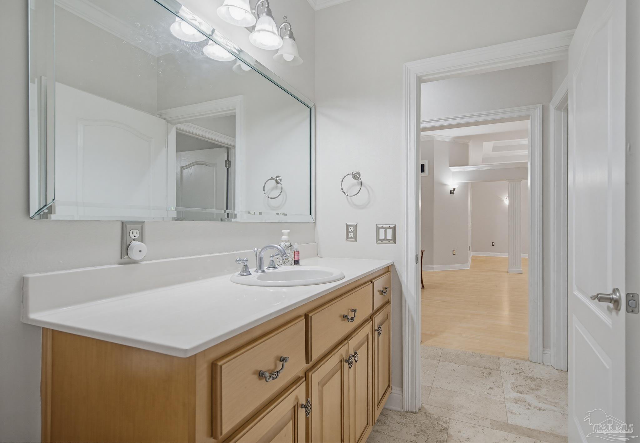 2855 Walling Road Milton, FL 32570 - Photo 43 of 55 a bathroom with a sink a mirror and a shower