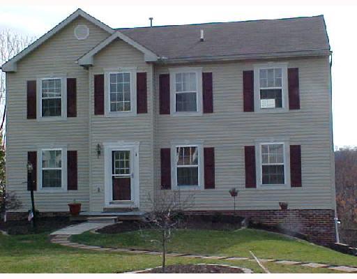 132 Cedar Ridge Drive Monaca, PA 15061 - Photo 1 of 14 Exterior Front. This Beautifully updated front has the shutters, freshly landscaped with a new sidewalk leading to the front.