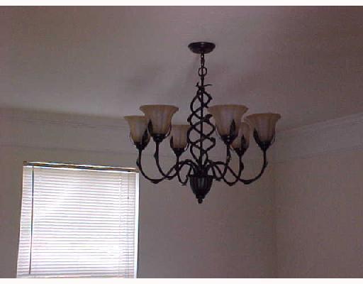 132 Cedar Ridge Drive Monaca, PA 15061 - Photo 3 of 14 Dining Room. The diningroom has a beautiful chandelier with newly painted walls.
