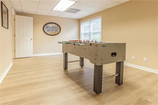 a view of a hallway with seating area