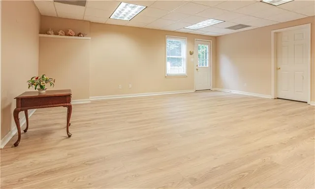 a view of an empty room with a window