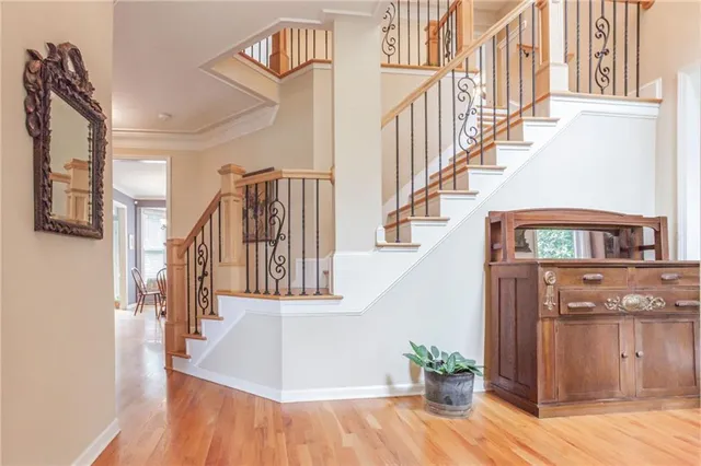 a view of stairs and the main door