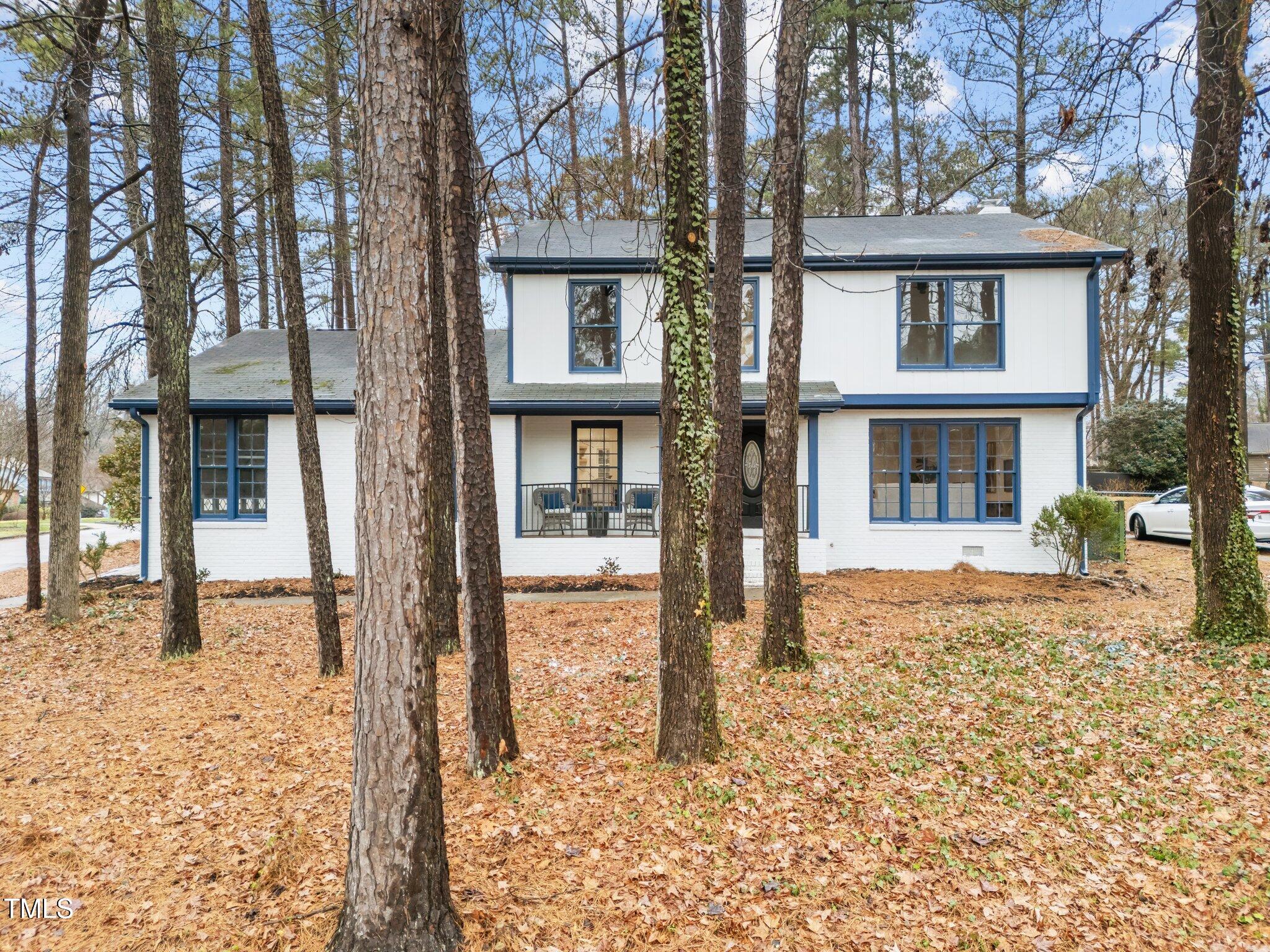 2001 Quail Ridge Road Raleigh, NC 27609 - Photo 1 of 40 front view of a house with a yard