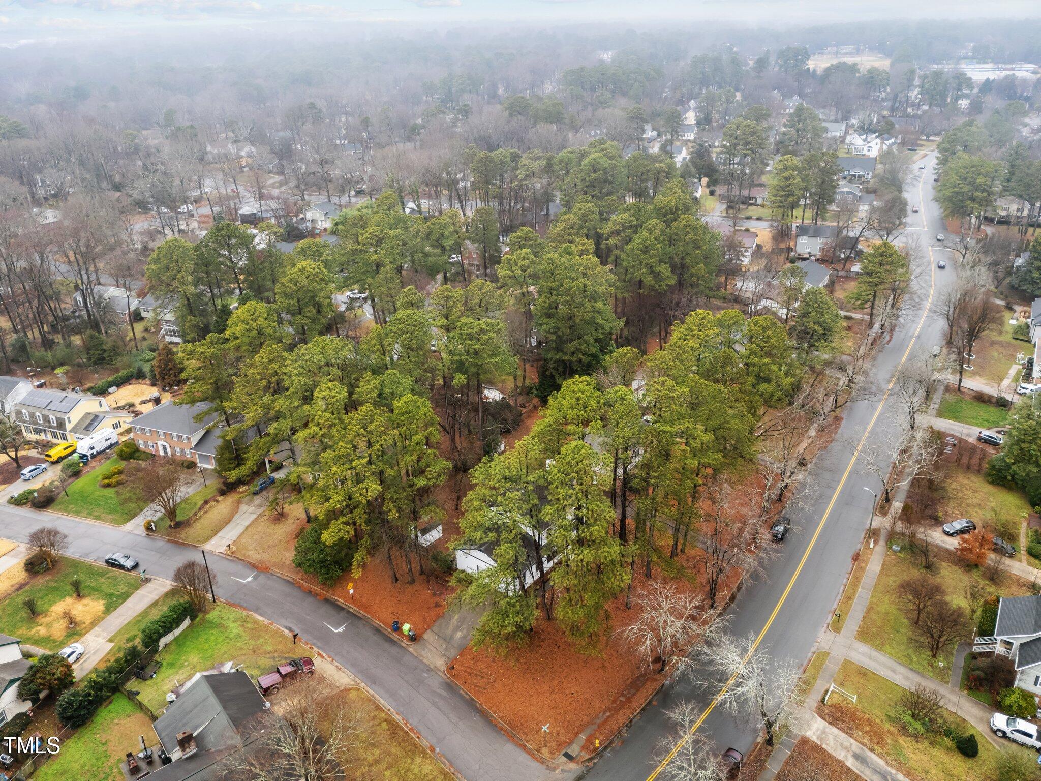 2001 Quail Ridge Road Raleigh, NC 27609 - Photo 35 of 40 an aerial view of a residential houses with yard