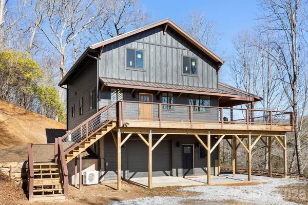 a front view of a house with parking