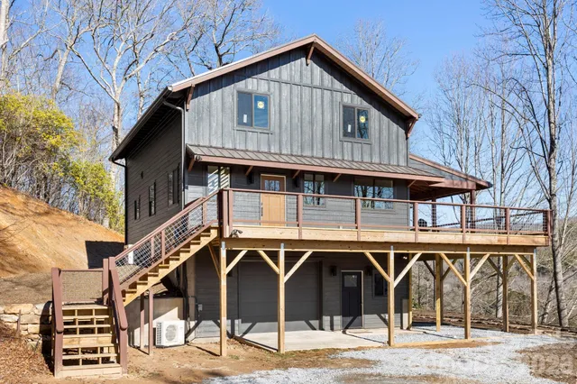 a front view of a house with parking