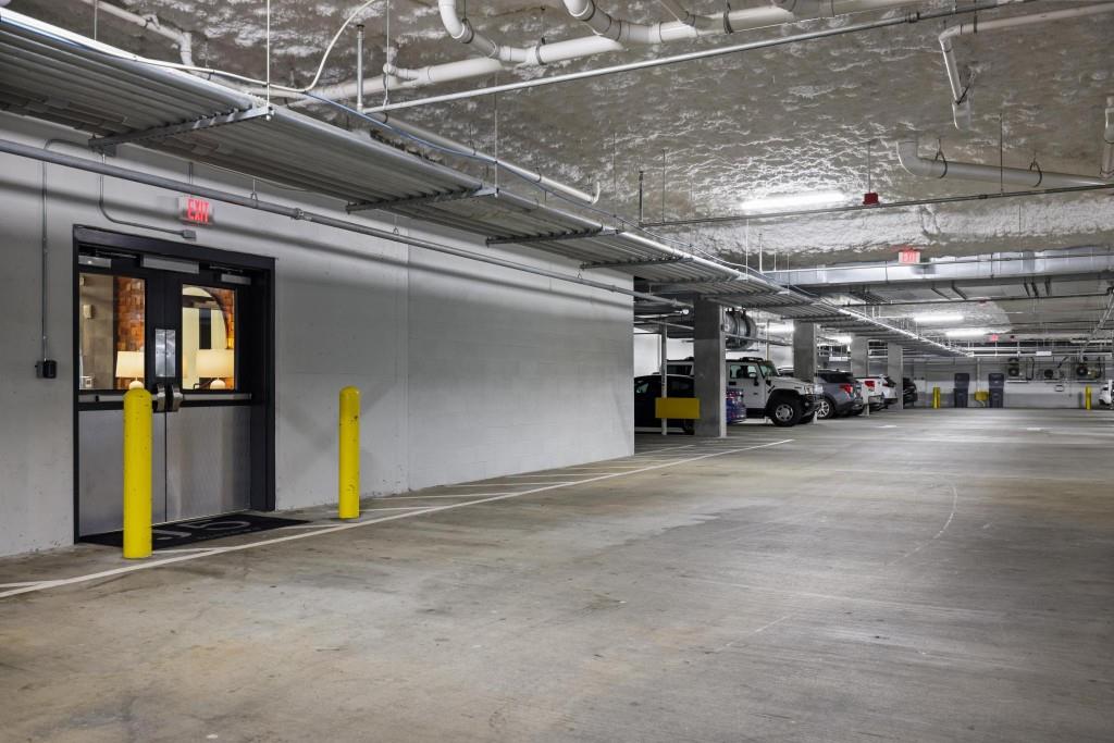 775 Juniper Street Northeast, Unit 602 Atlanta, GA 30308 - Photo 40 of 40 a view of parking garage with cars