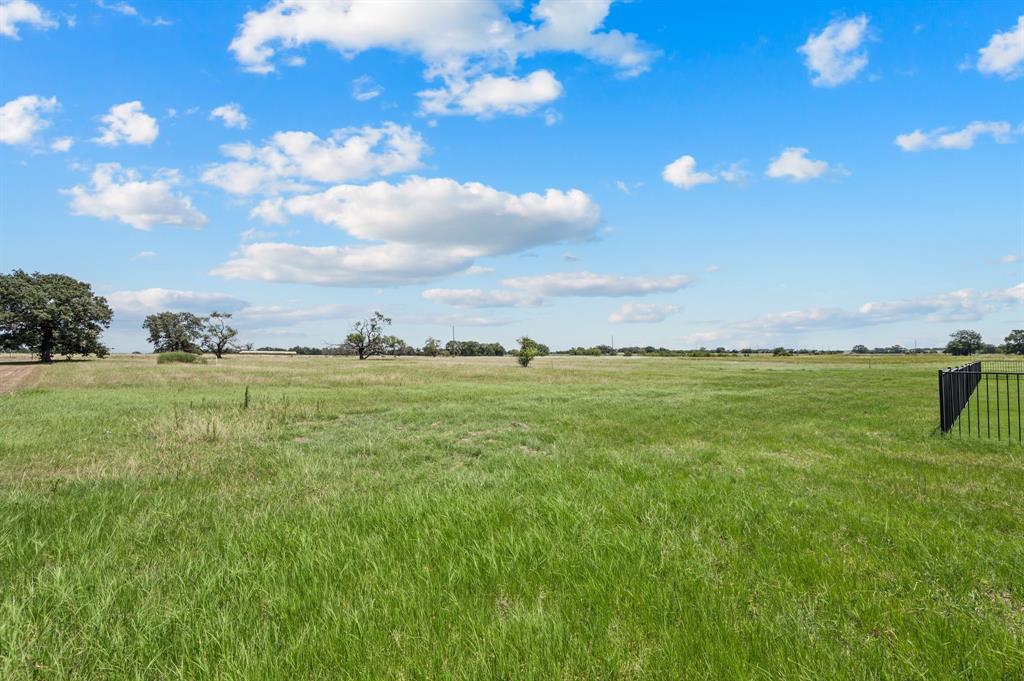 2705 Gospel Road Tolar, TX 76476 - Photo 32 of 36 Expansive open field with natural grass and scattered mature trees