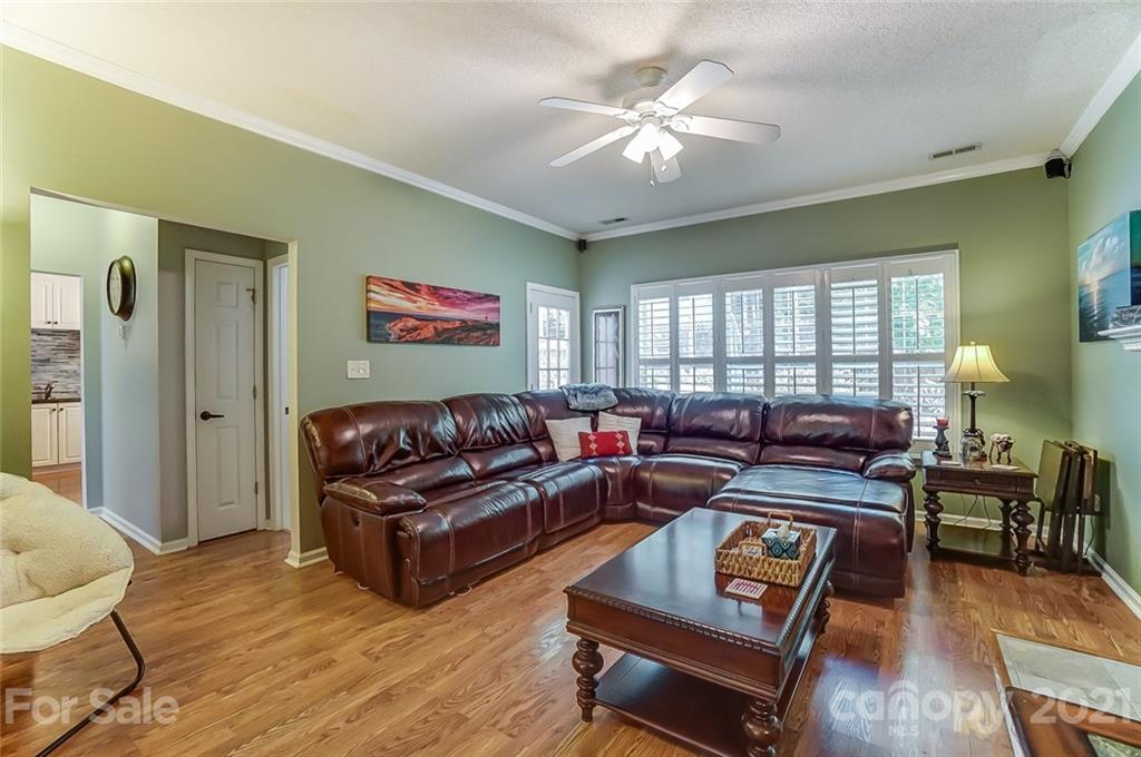 744 West Cheval Drive Fort Mill, SC 29708 - Photo 11 of 47 a living room with furniture and wooden floor
