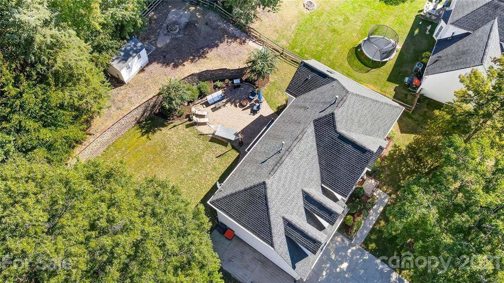 744 West Cheval Drive Fort Mill, SC 29708 - Photo 3 of 47 an aerial view of a house with a yard and potted plants