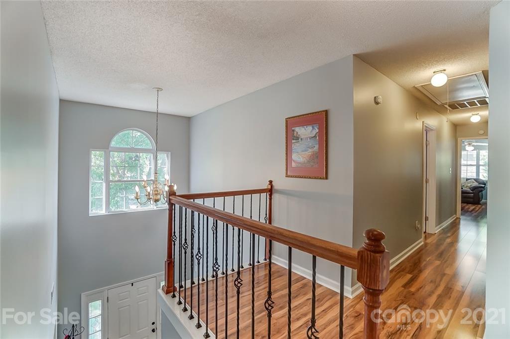 744 West Cheval Drive Fort Mill, SC 29708 - Photo 22 of 47 a view of a hallway with windows